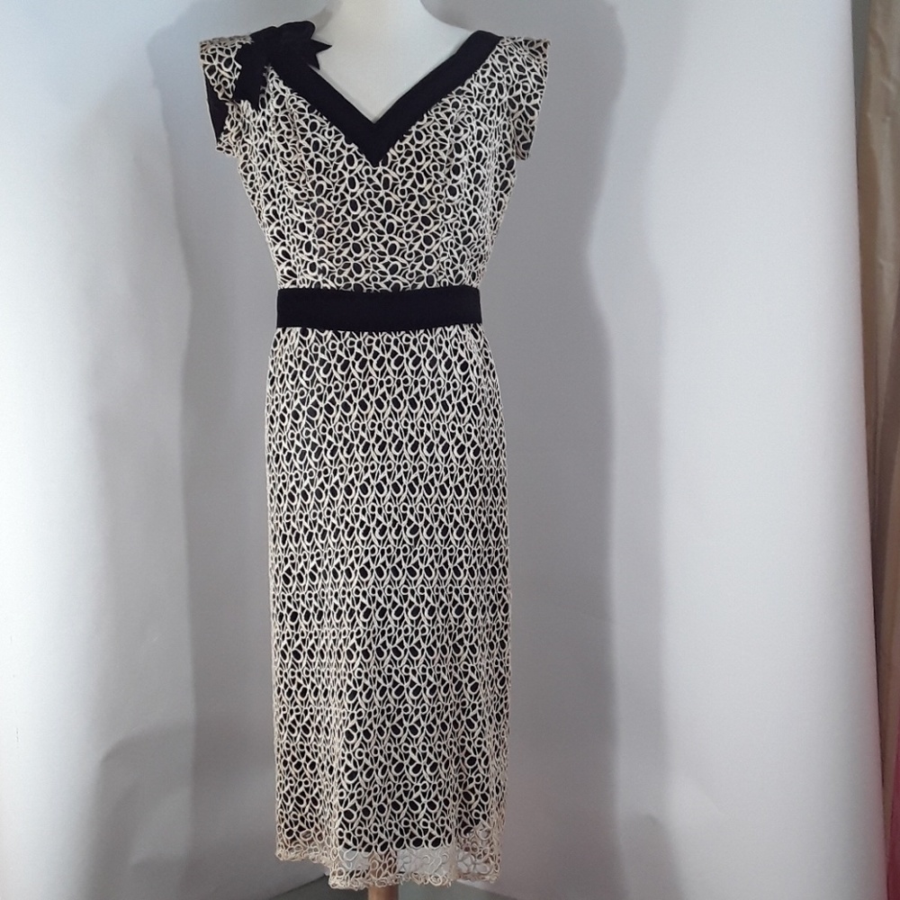 Custom made evening dress with lace and V neck.